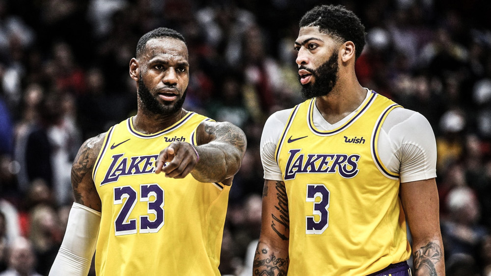  詹姆斯准三双 湖人险胜勇士  